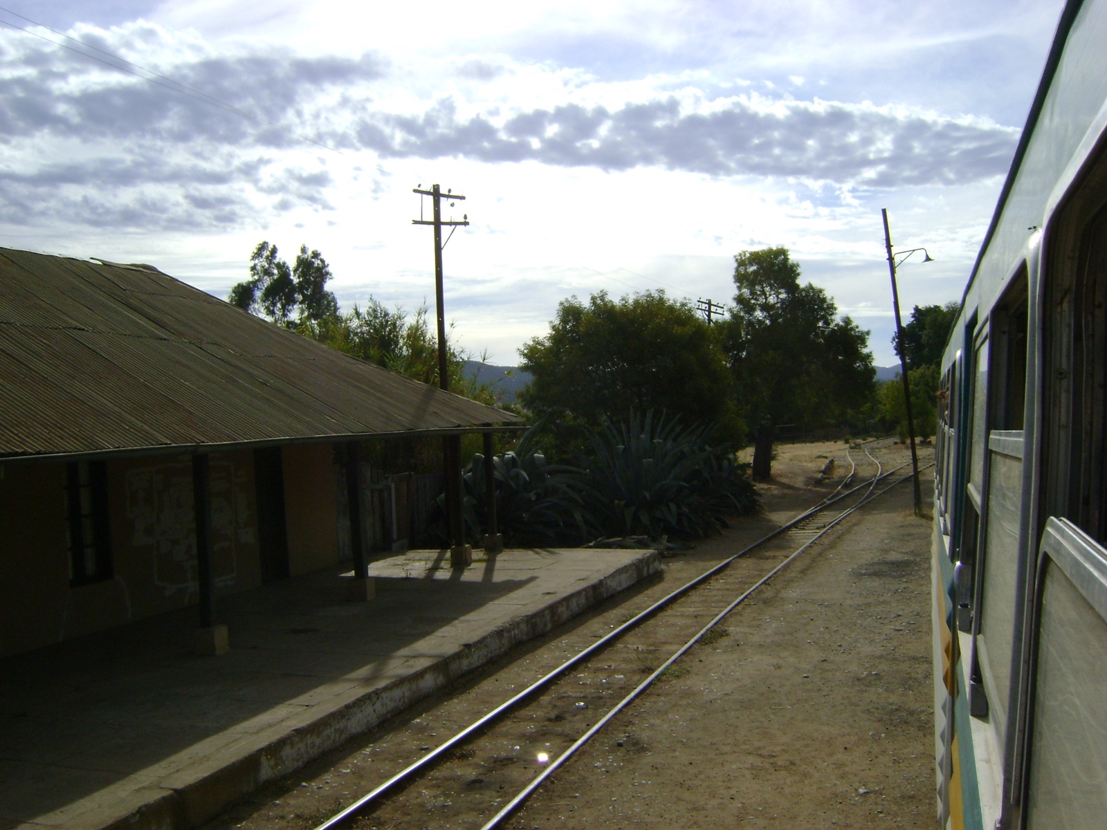 The adobe station house at González Bastías seen from the Maule valley train, Chile.