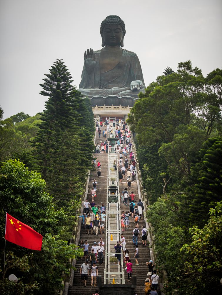 The Tian Tan Buddha above the 268 steps at Ngong Ping, with visitors climbing