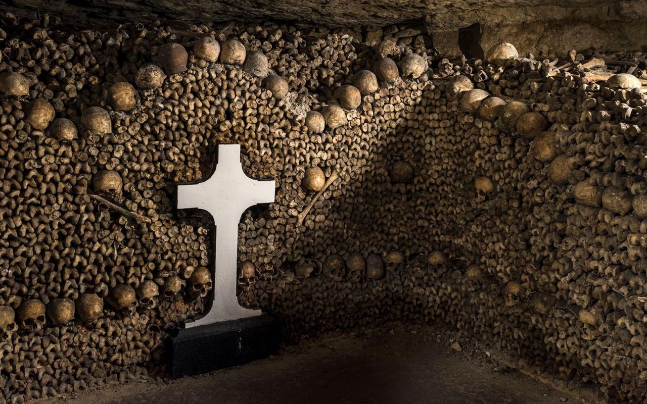 Catacombs of Paris bone tunnel skulls ossuary