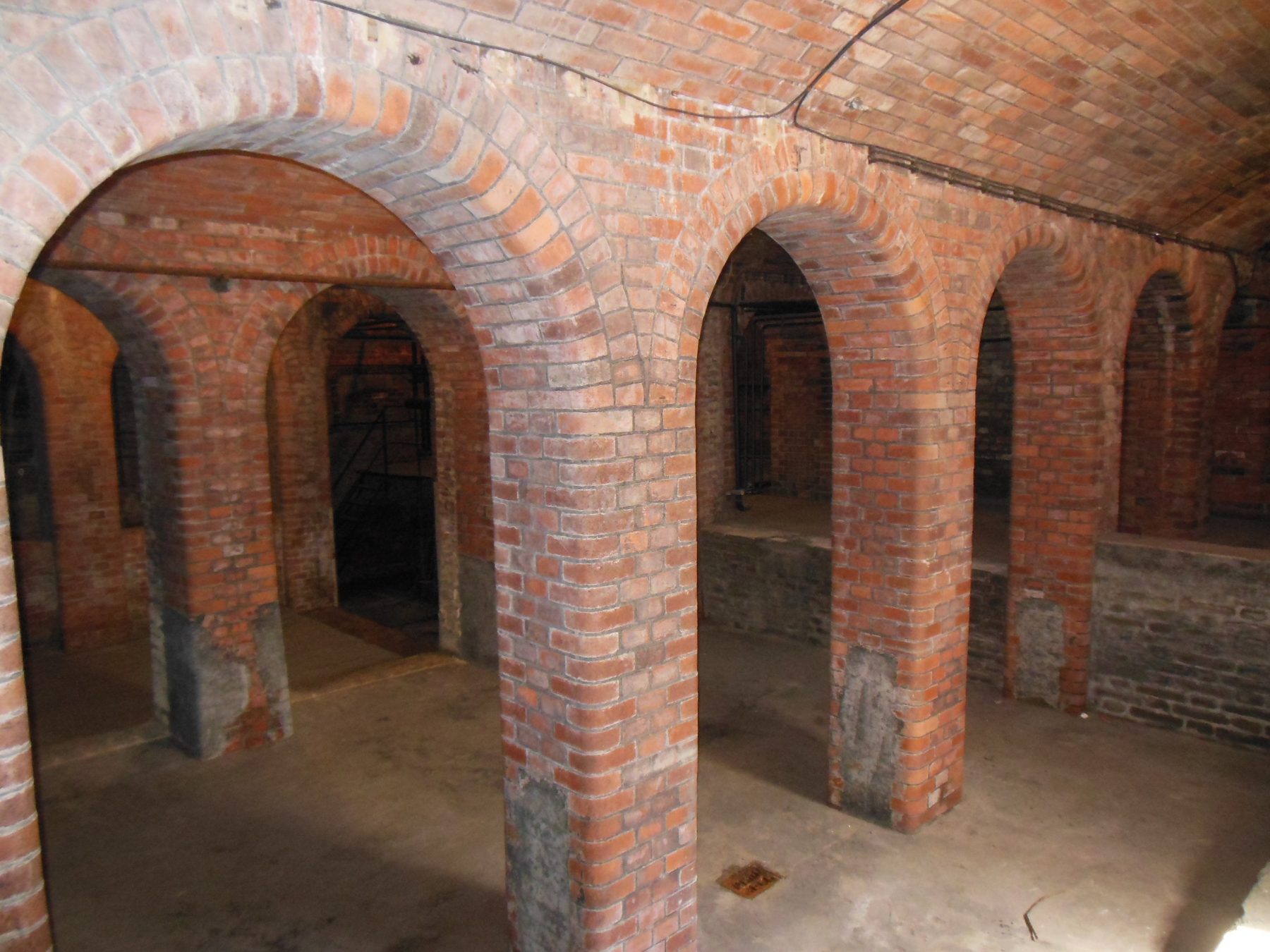 A brick-vaulted underground chamber at the old Bubenec wastewater plant in Prague