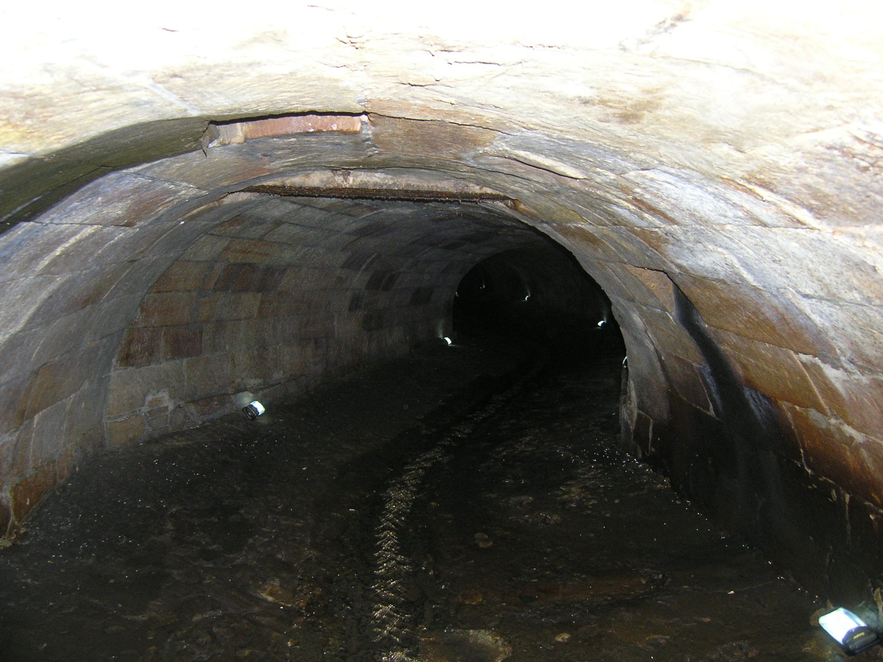 Inside the brick-lined underground culvert of the Tank Stream, Sydney